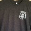 Close up of front of RPBA Gray badge T-shirt