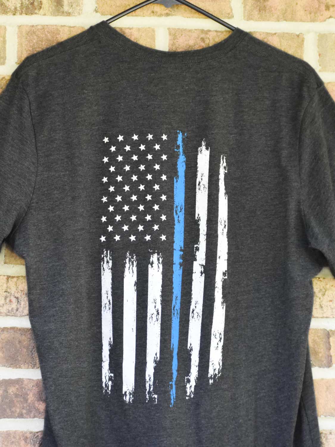 Close up of back of RPBA Gray flag T-shirt